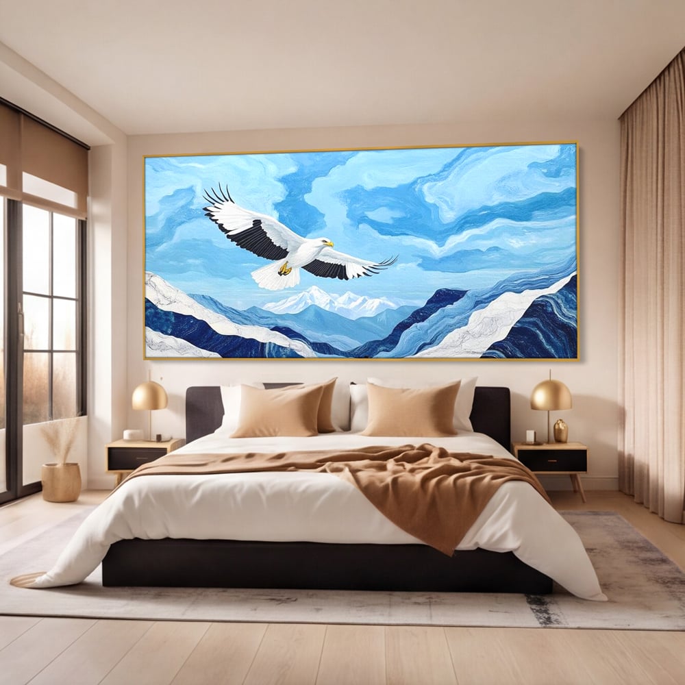 Tablou canvas cu tablou canvas cu vultur in zbor peste munti, in rama de aluminiu auriu, pe perete intr-un dormitor